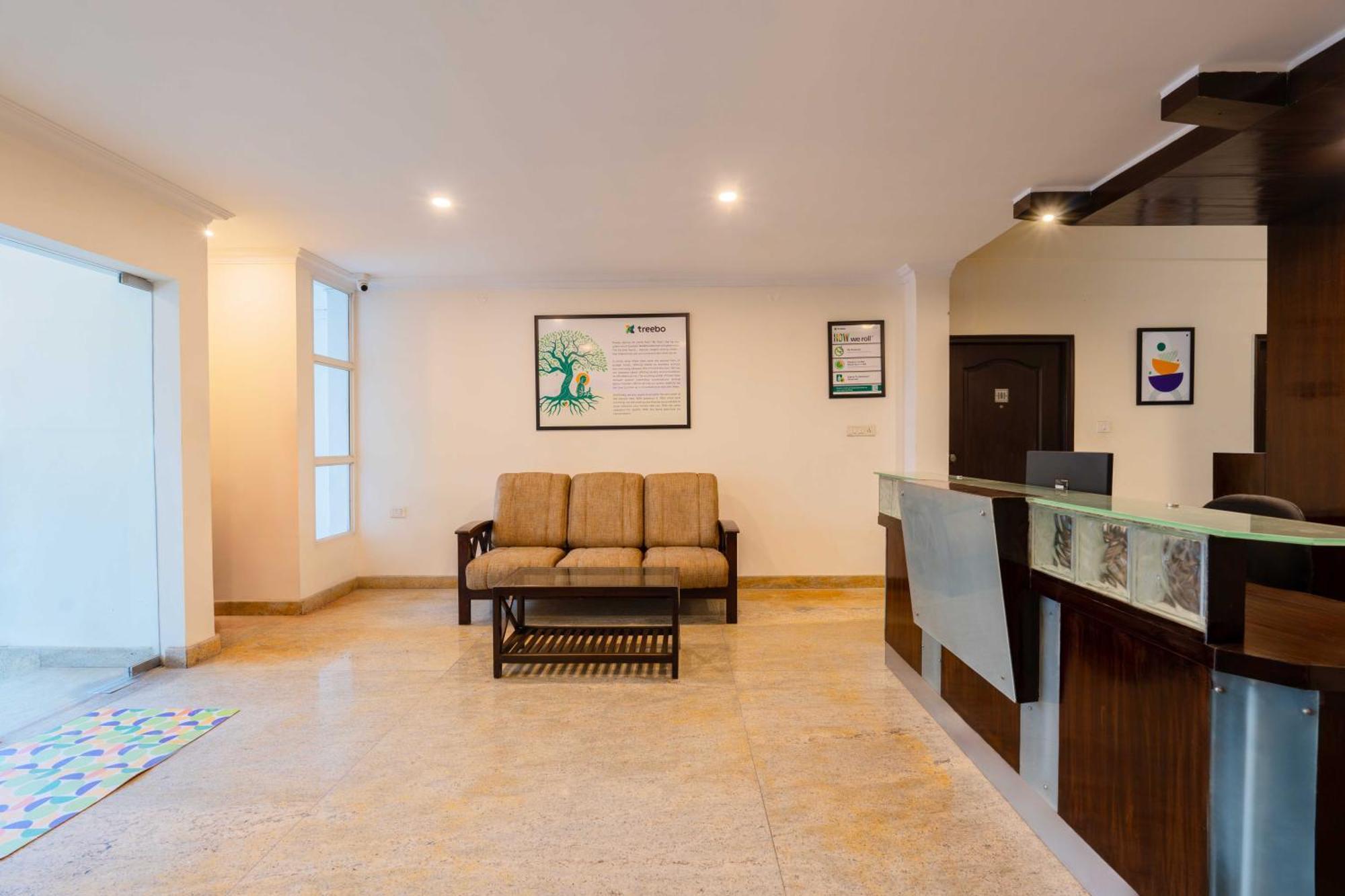 Treebo Ivory White Inn Bangalore Buitenkant foto